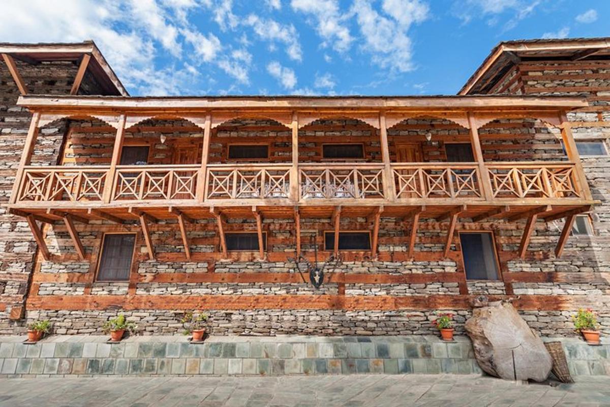 a building with a balcony on the side of it