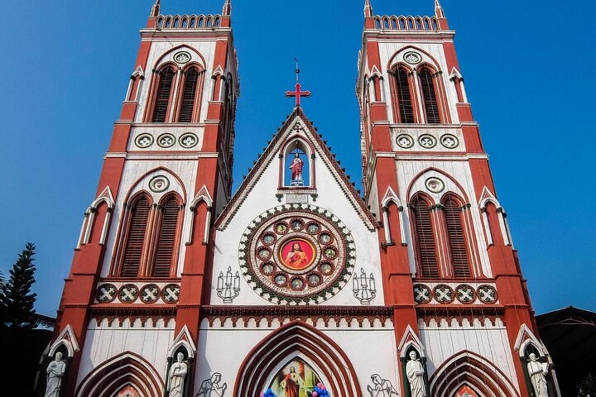 a church with two towers with a clock on it