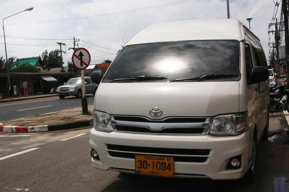 a white van parked on the side of a street