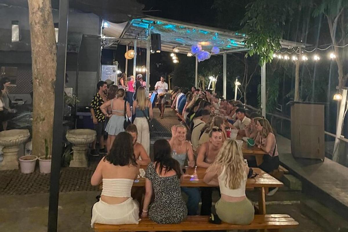 a group of women sitting at tables at a party