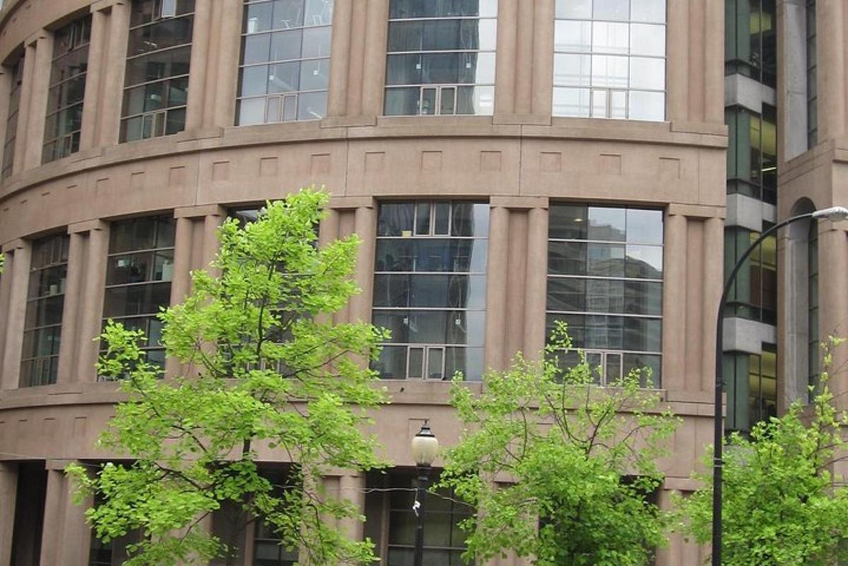 a large building with trees in front of it