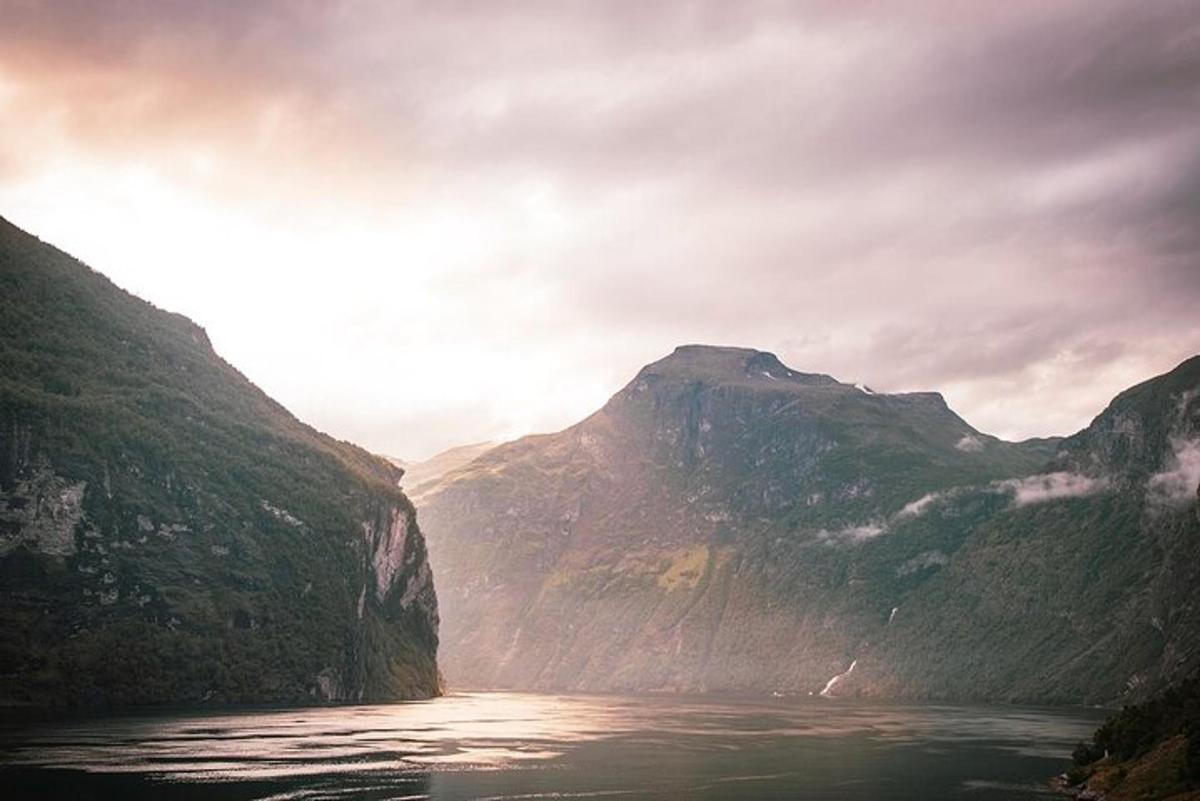 a view of a river between two mountains