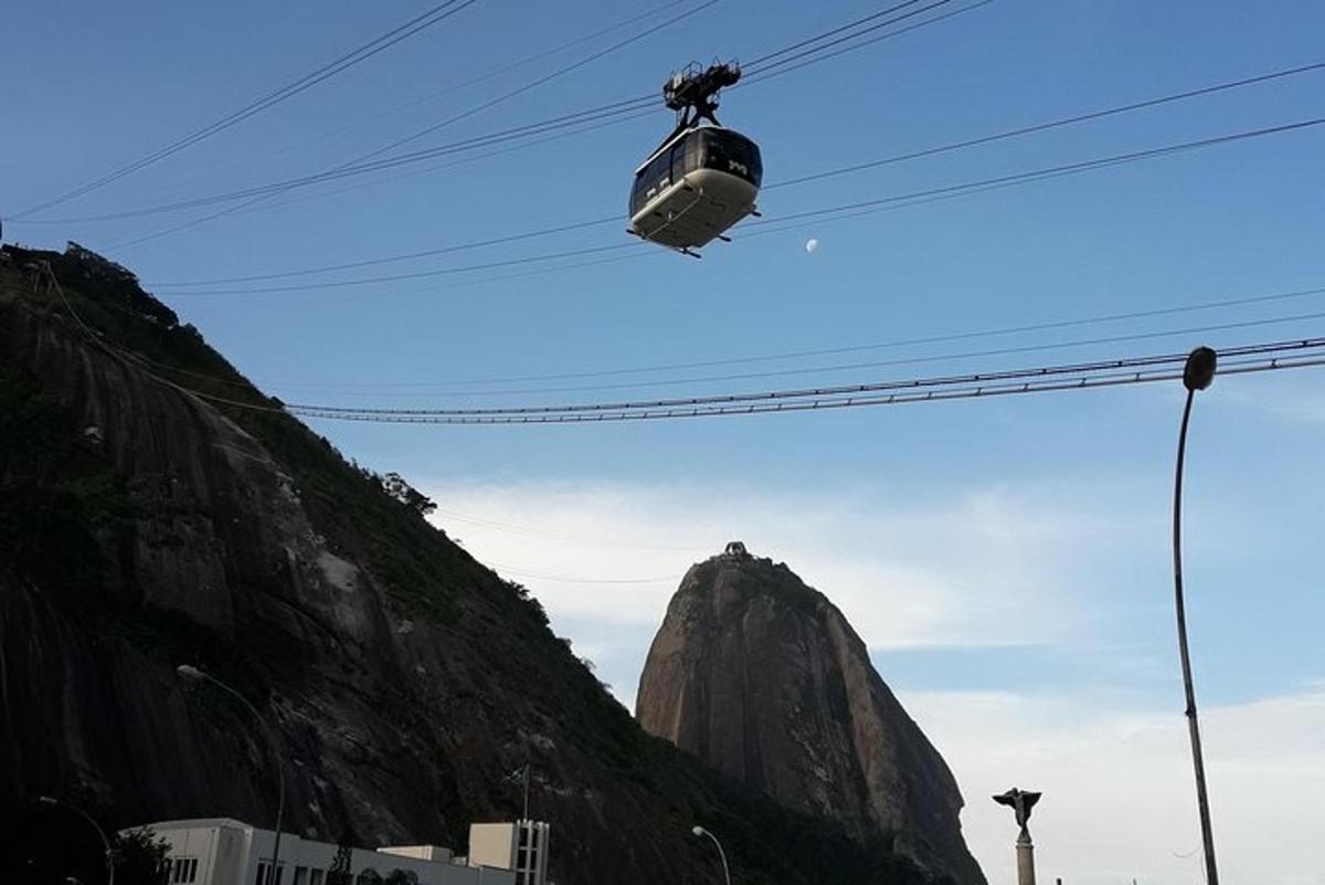 a cable car in front of a mountain