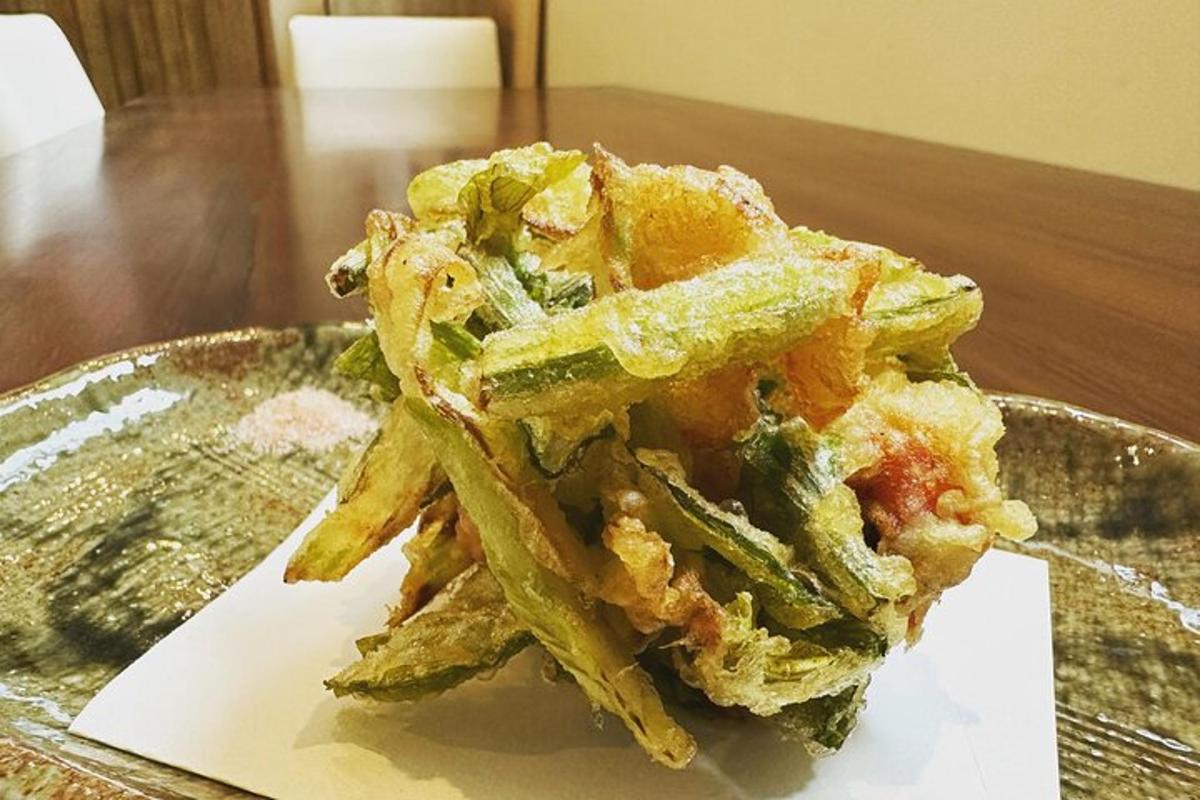 a plate of food on a wooden table