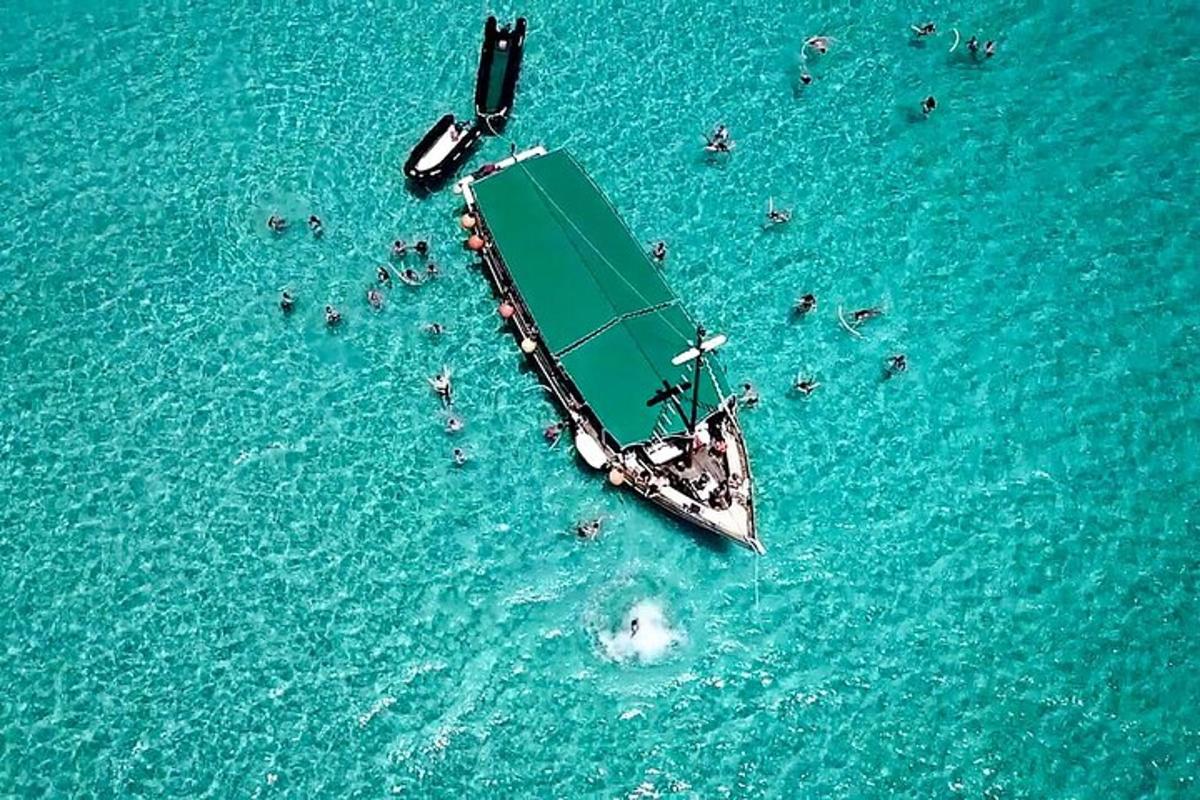 a boat in the water with people on it