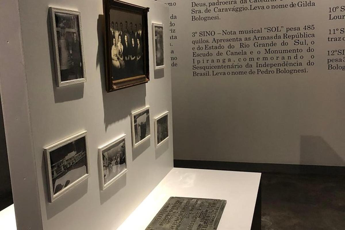 a museum exhibit with a black and white photograph on a wall