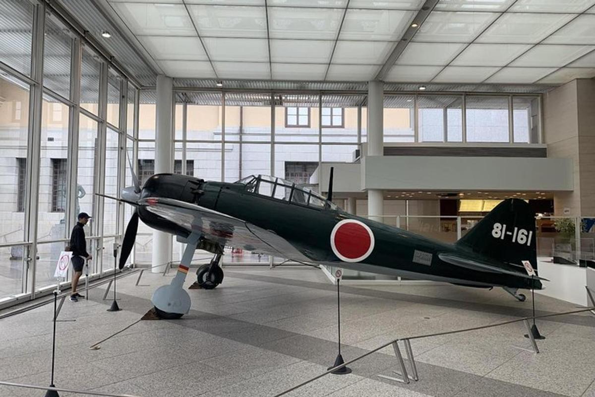 a small plane is on display in a museum