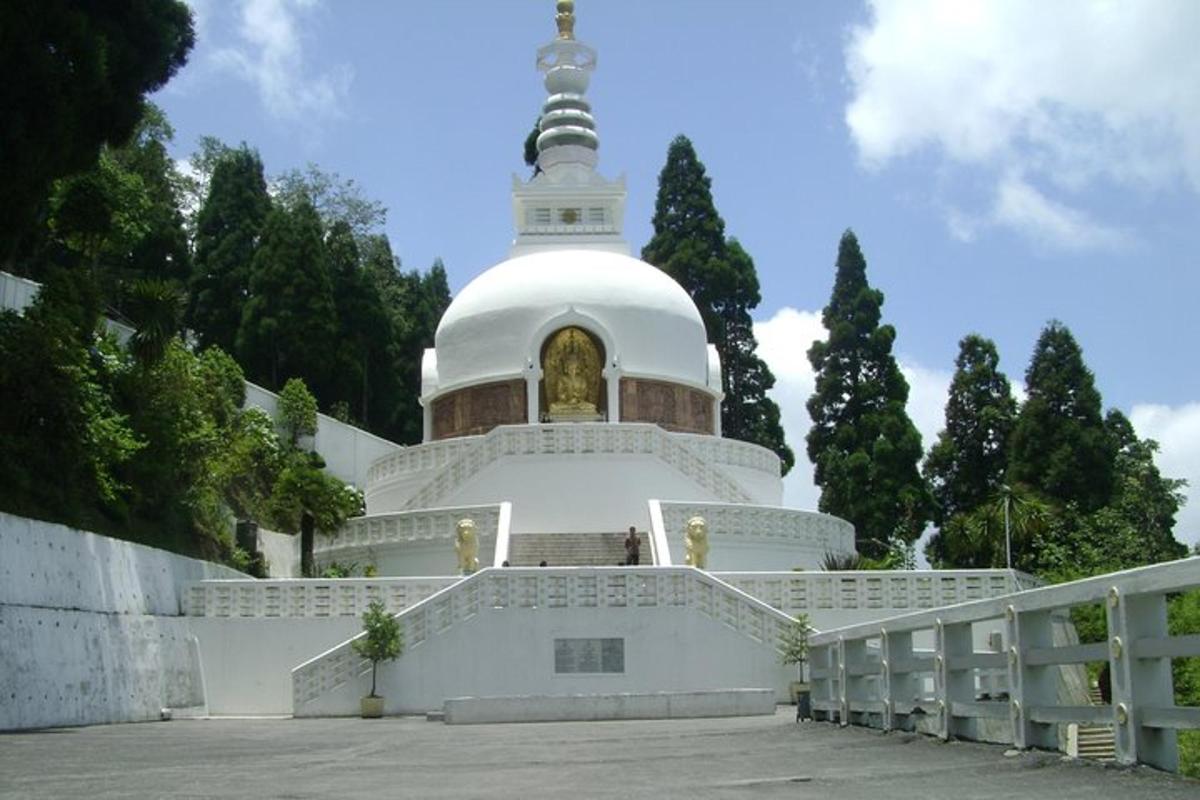 a large white building with a steeple on top