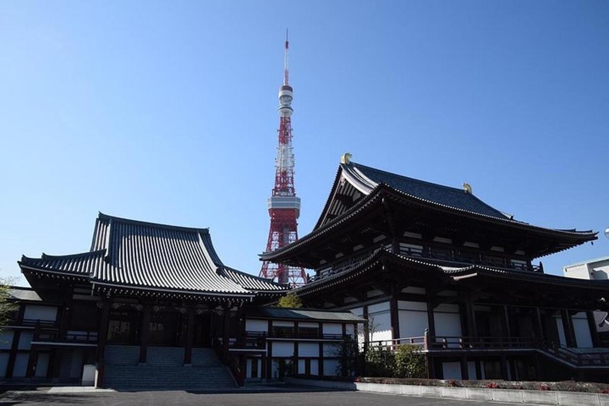 a large building with a tower in the background