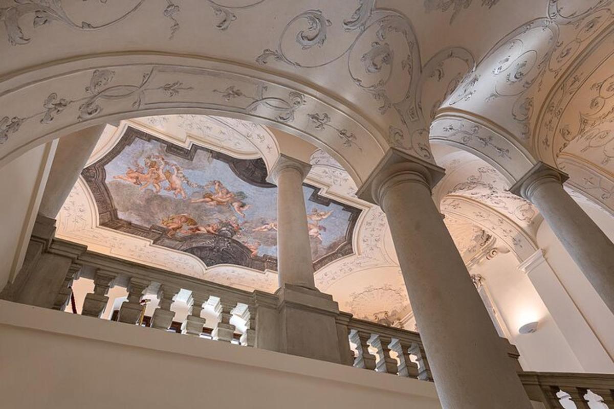 a building with a painting on the ceiling