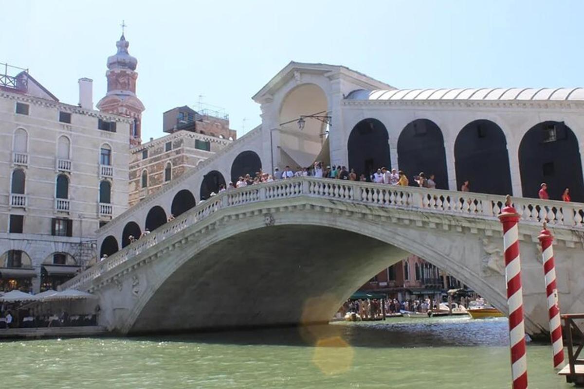 a bridge over a river with a group of people on it