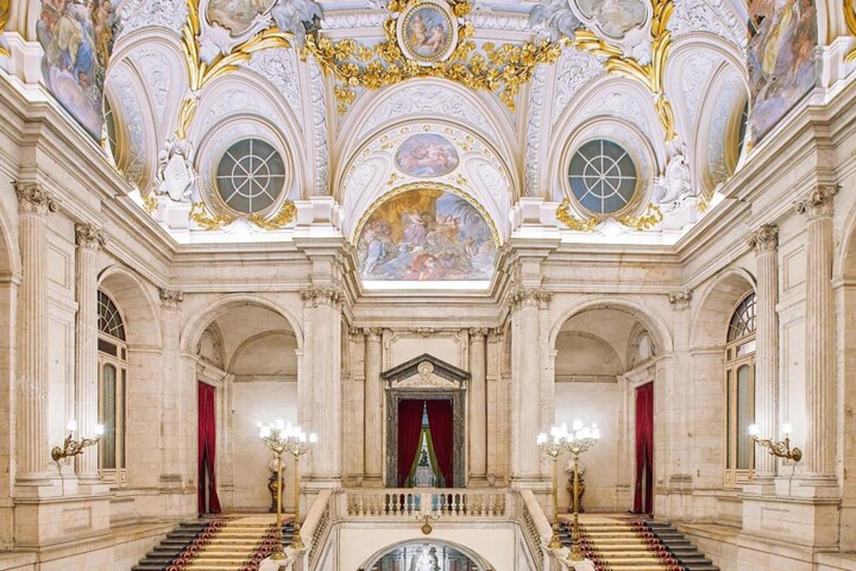 a large room with a ceiling with paintings