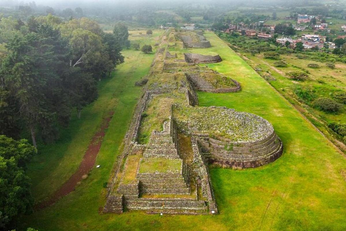 an aerial view of the ruins of the mayan pyramid