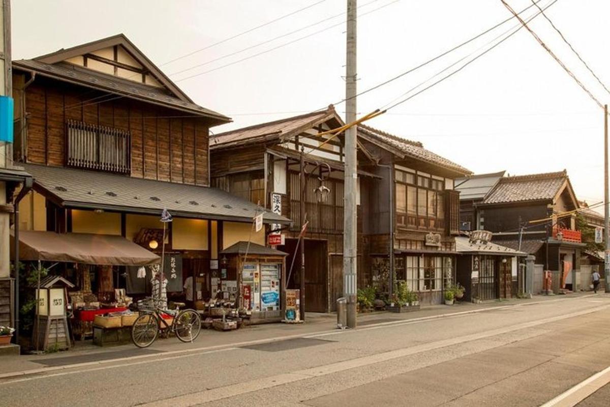 a street in an asian town with buildings