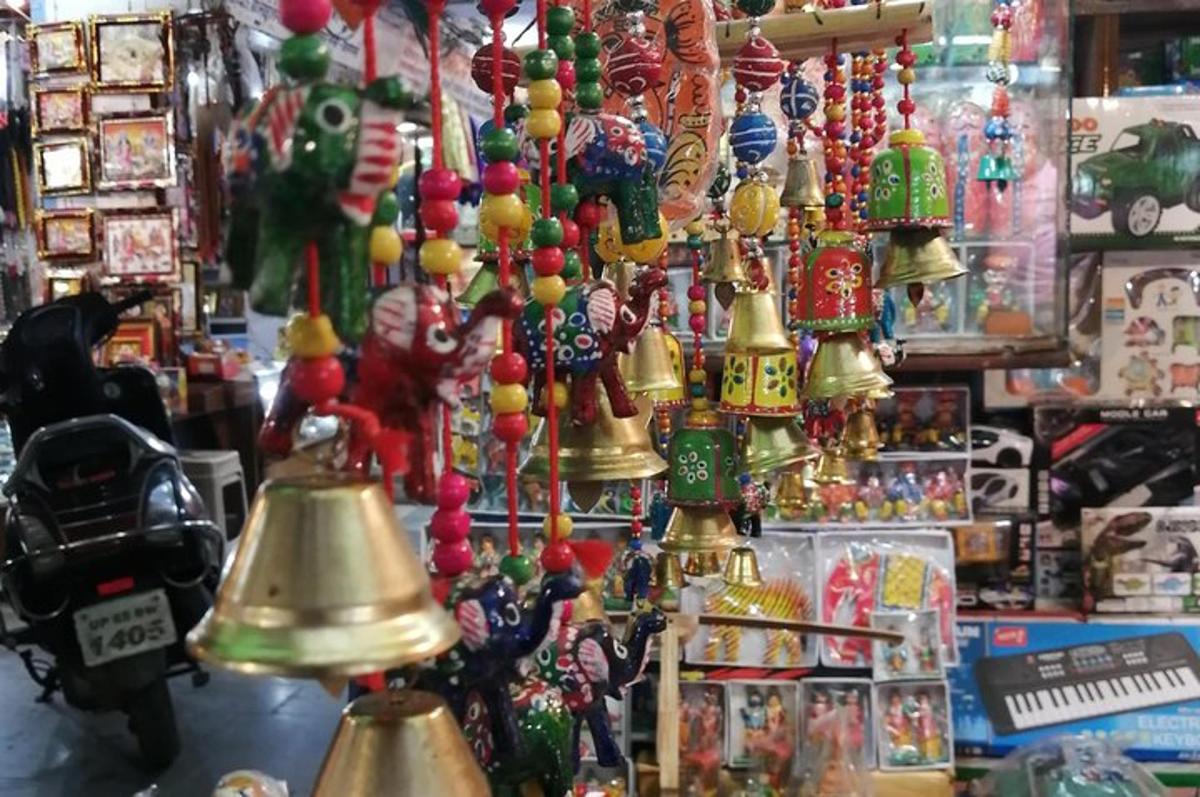 a group of bells hanging in a store
