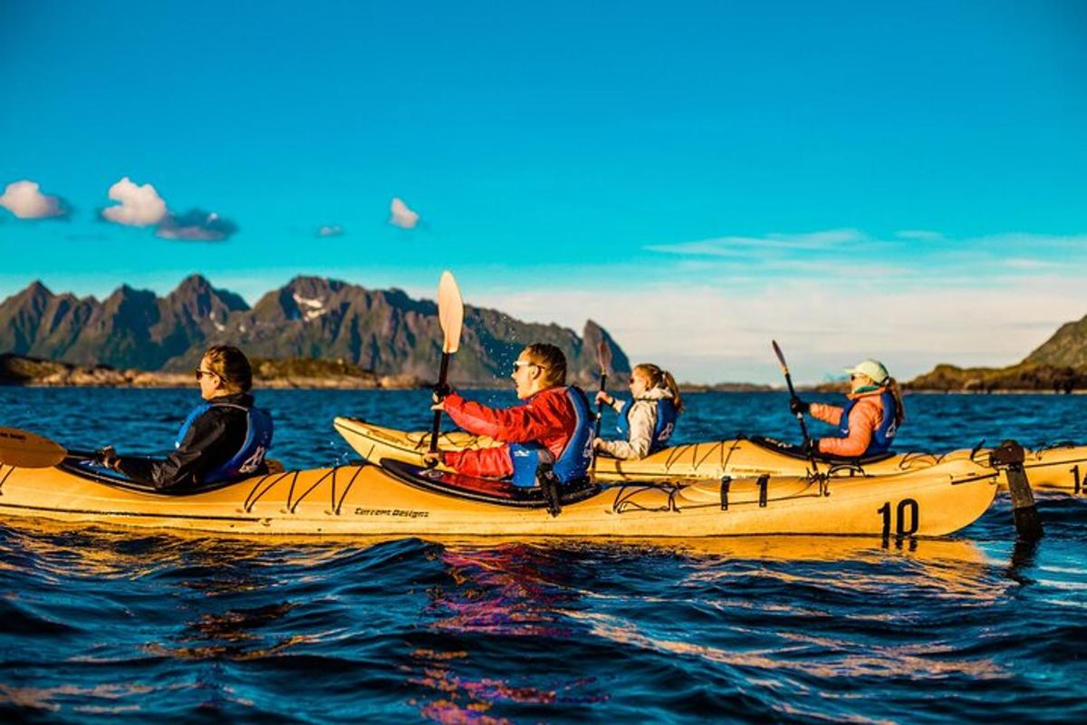 a group of people in a canoe on the water