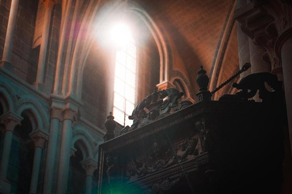 a light shines on a wall in a church