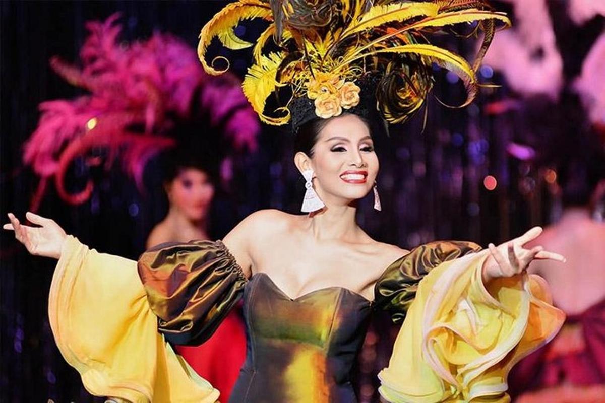 a woman in a costume on a stage