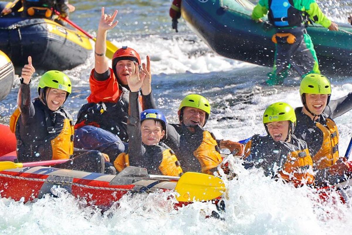 a group of people on a raft in the water