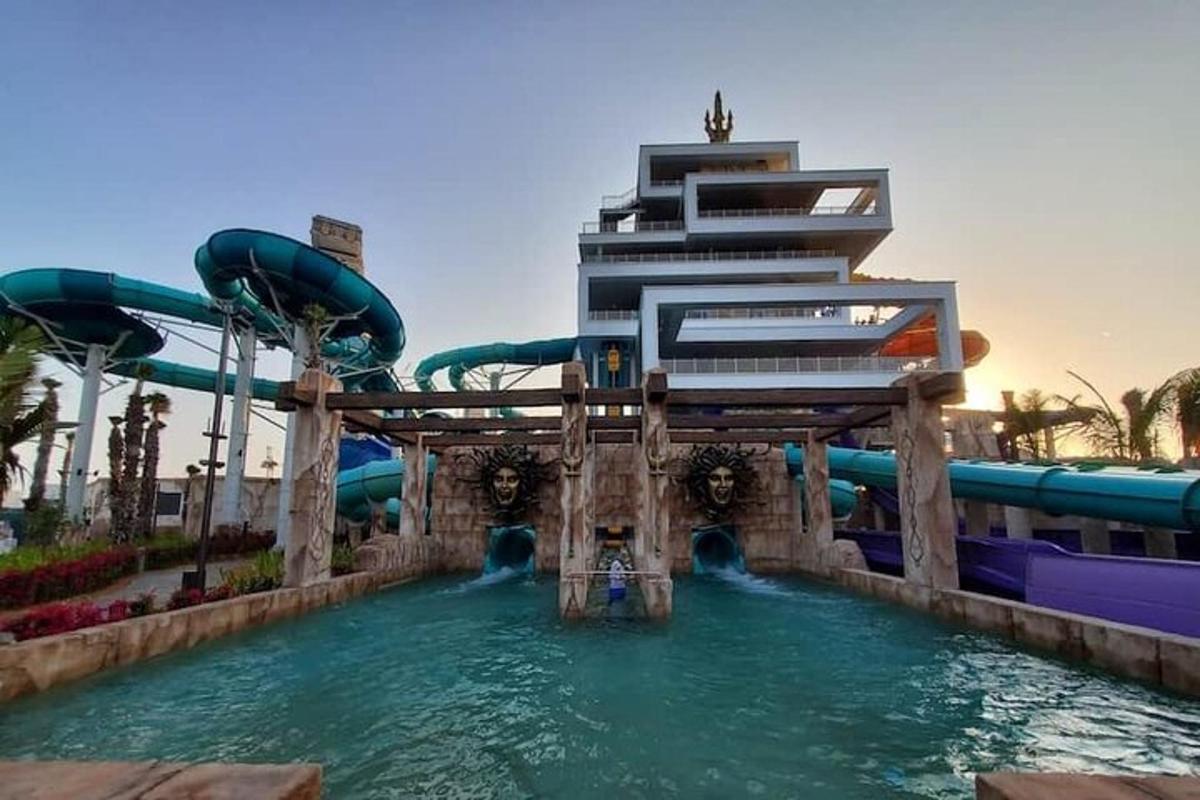 a water slide in the middle of a water park