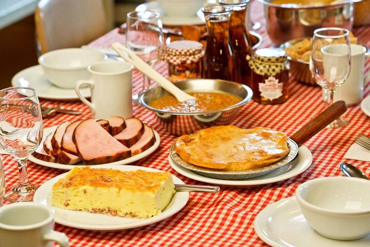 a table topped with plates of food on a table