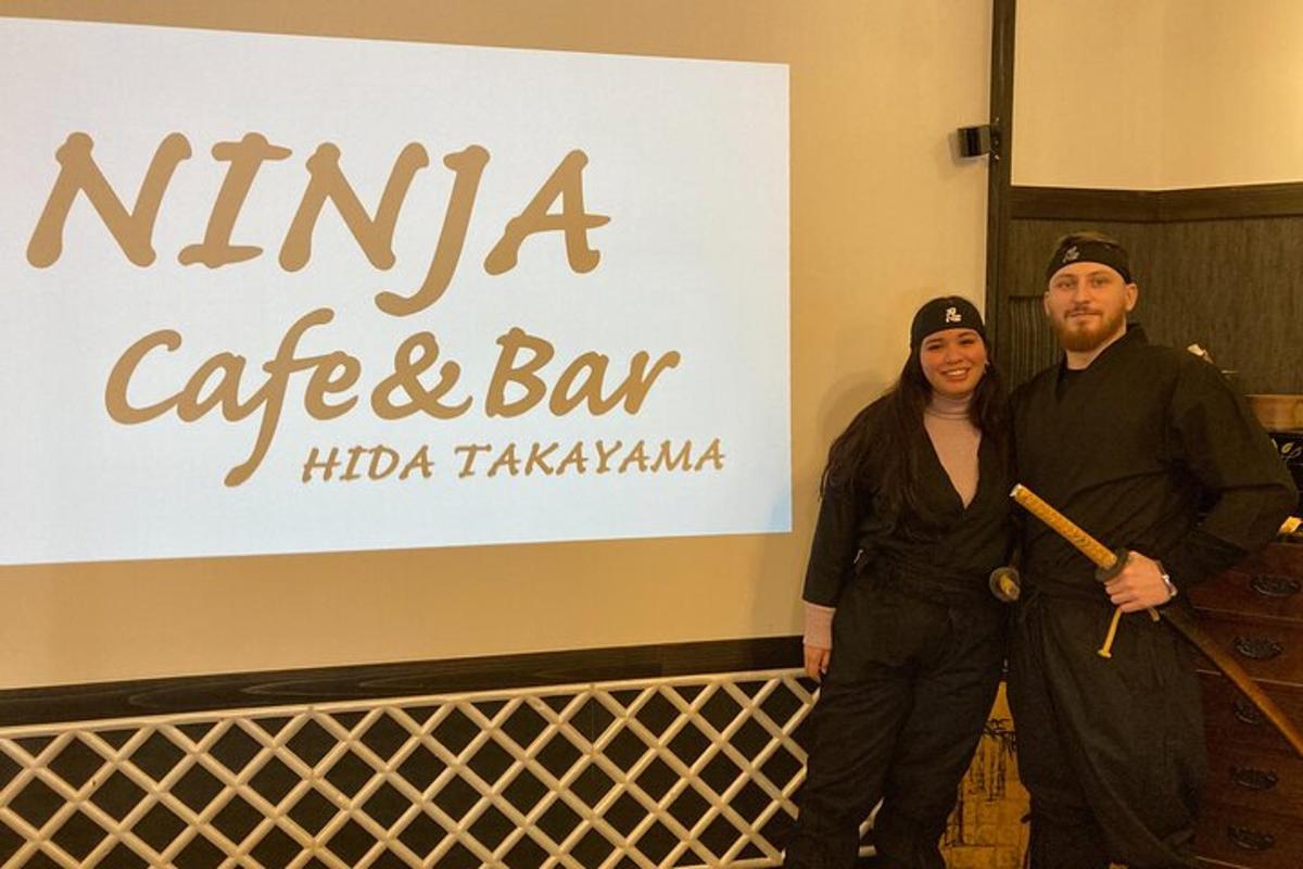a man and a woman standing in front of a sign