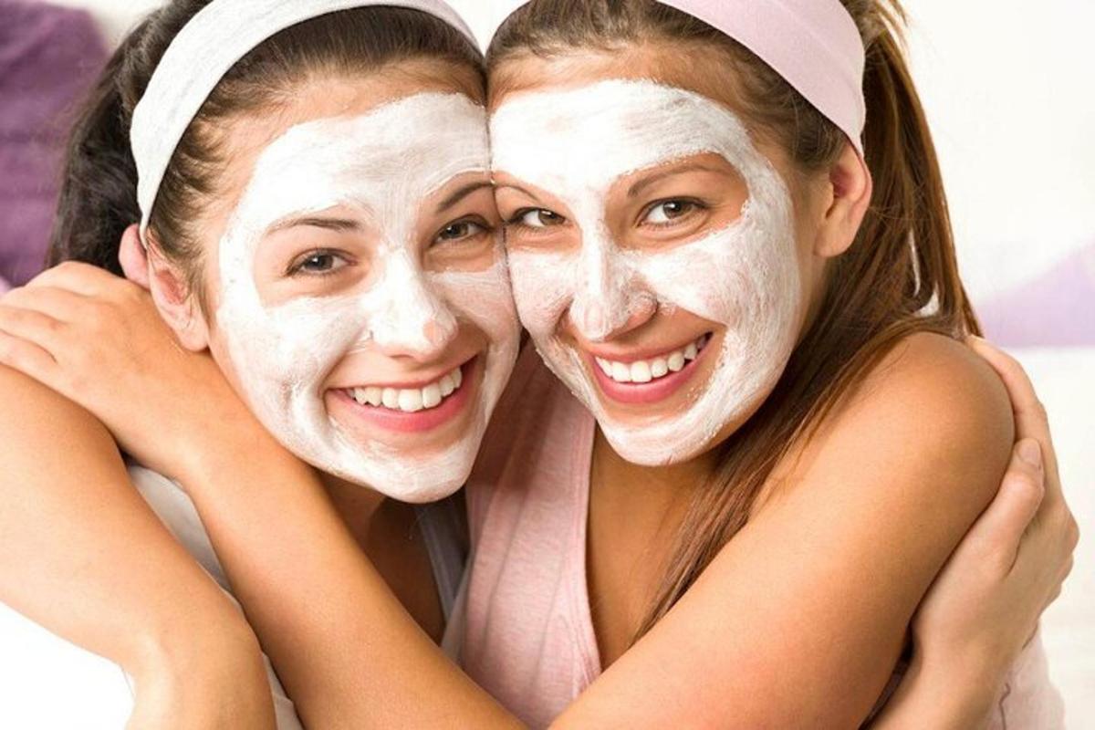 two women with a mask on their faces