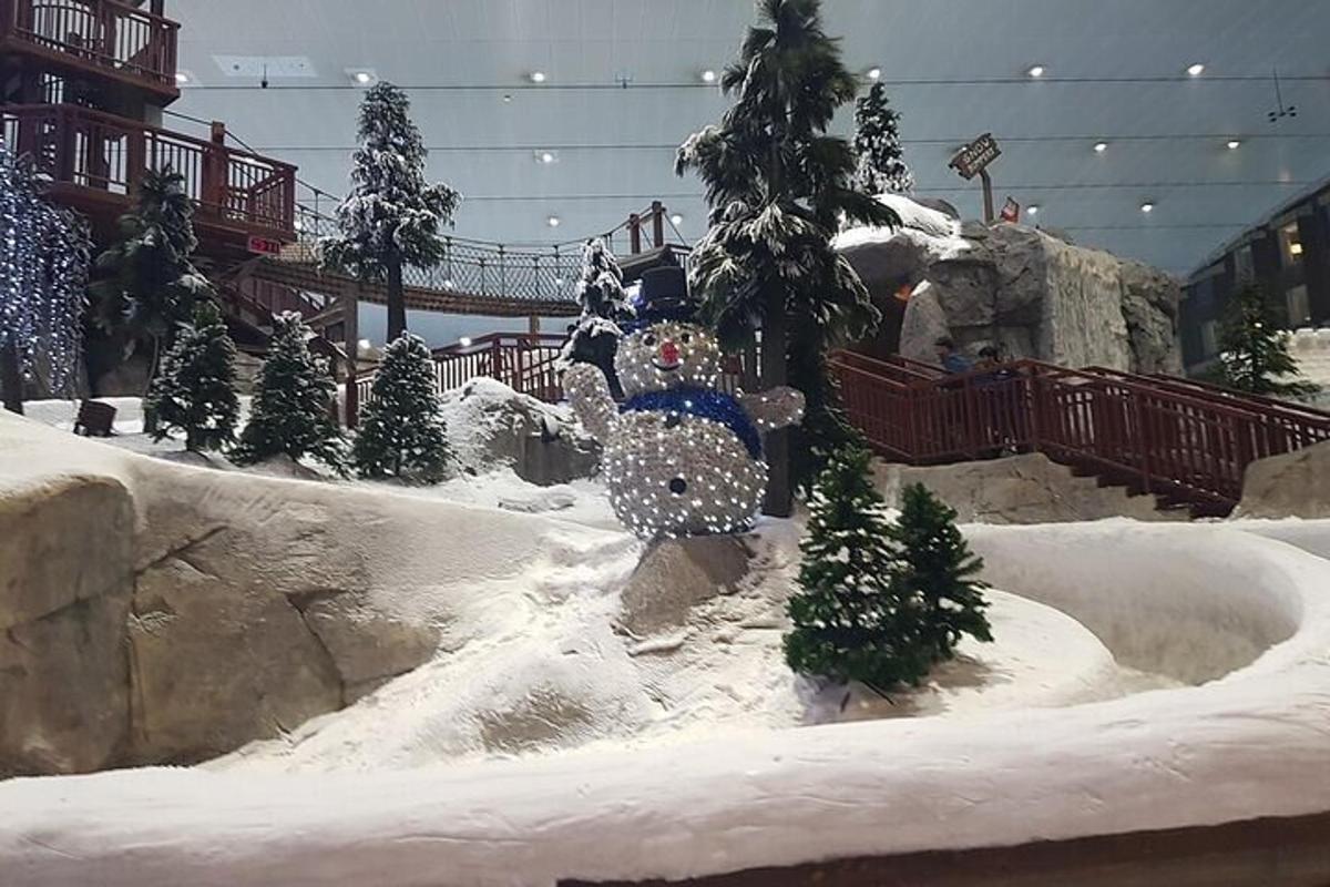 a fake christmas display with trees and snow