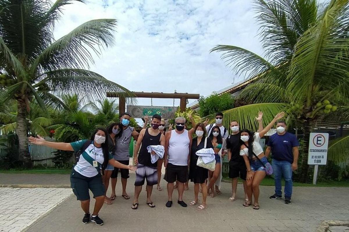a group of people are posing for a picture