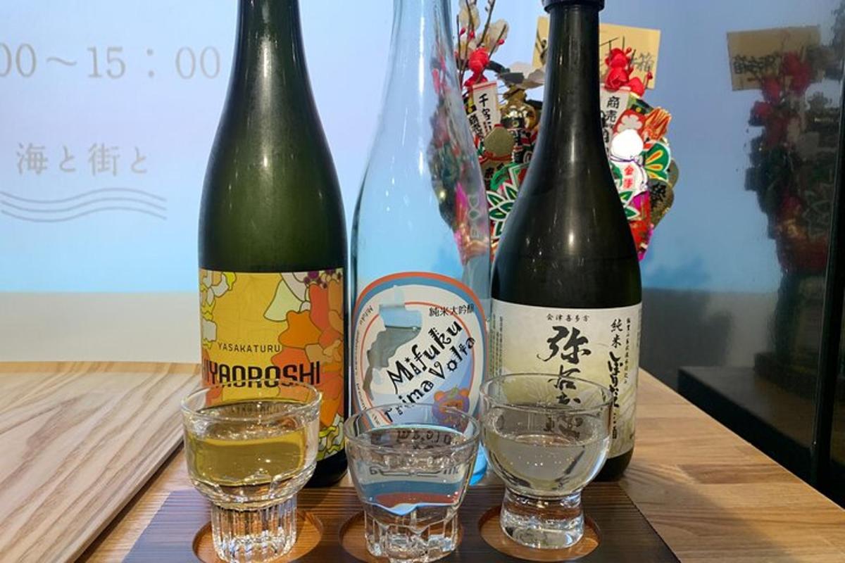 dua botol wain dan dua gelas di atas meja