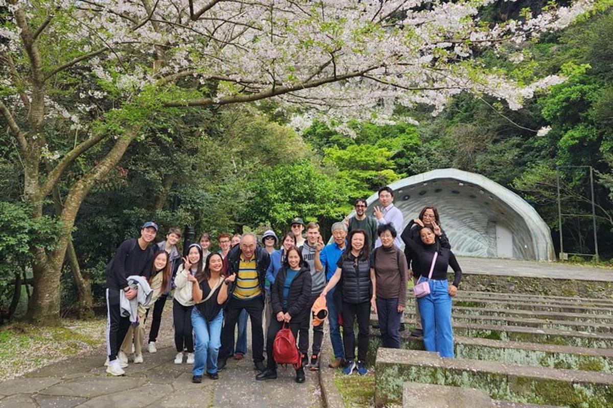 a group of people posing for a picture on some stairs