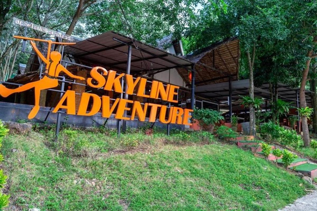 a sign that says swing adventure in front of a building