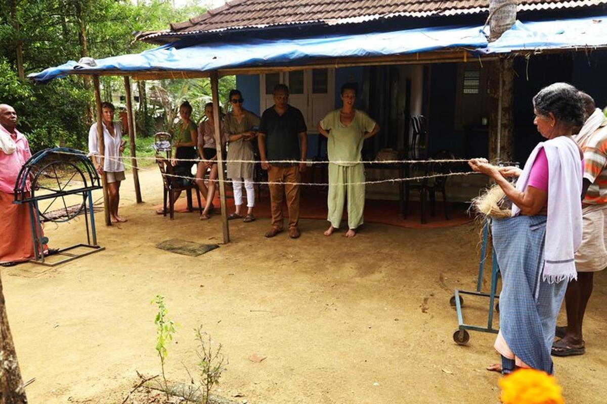 a group of people standing around a fence