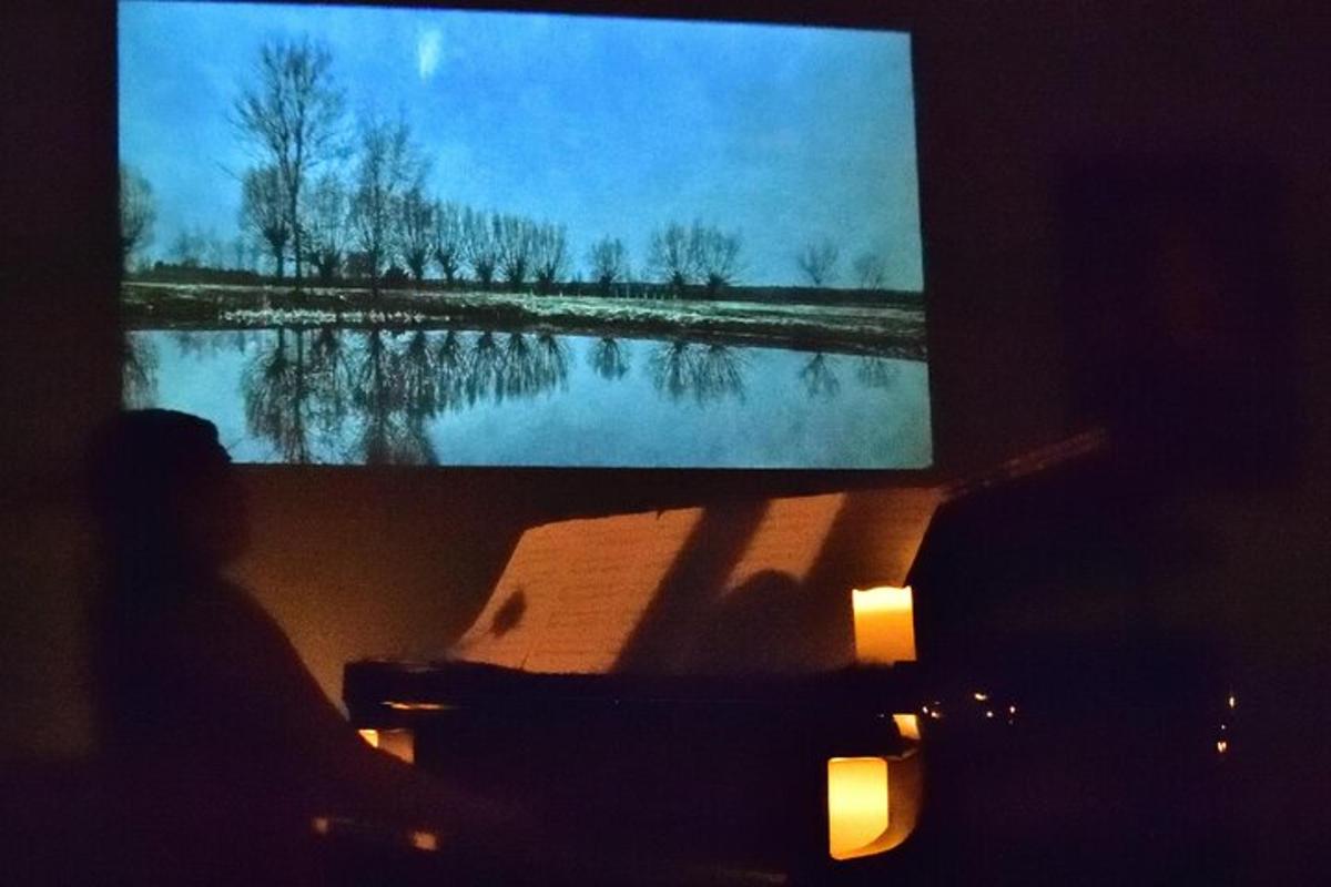 a tv screen with a picture of a lake