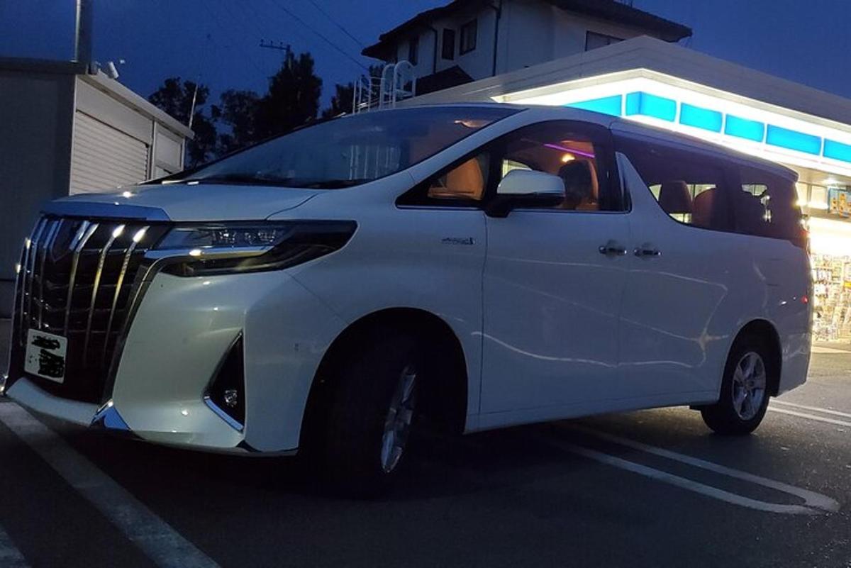 a white van is parked on a street