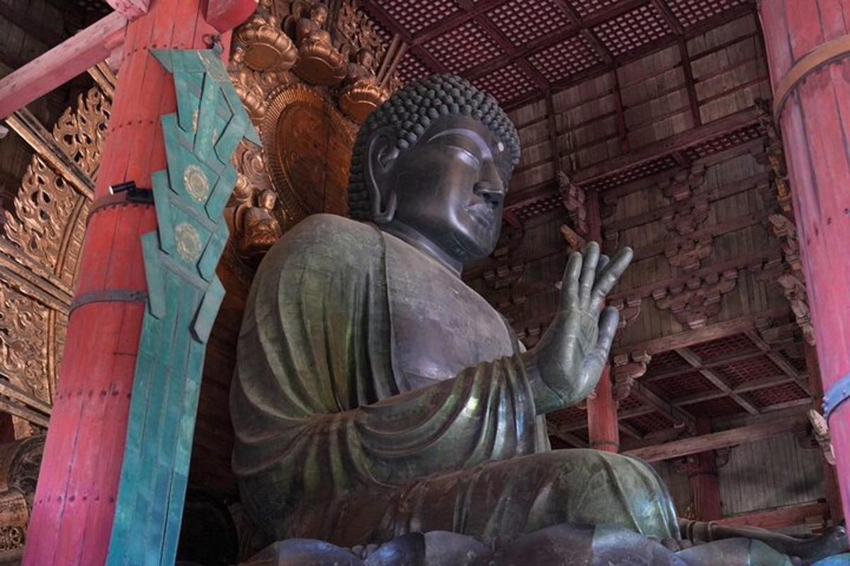 a large statue of a buddha in a building