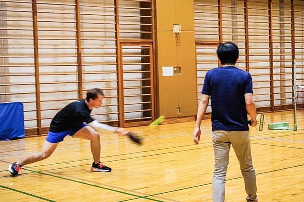 two men are playing a game of frisbee