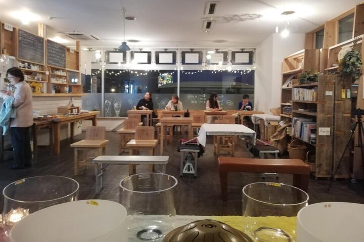 a restaurant with people sitting at tables in a room