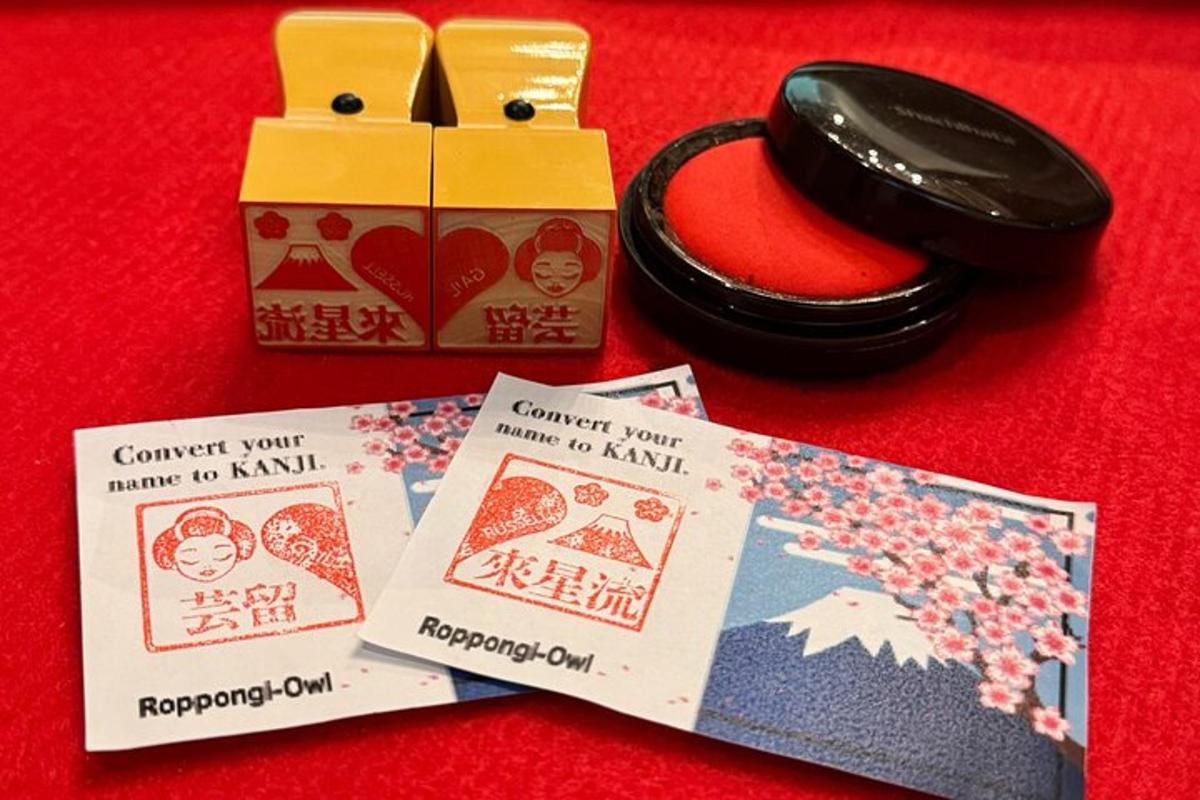 a table with cards and a phone and a box