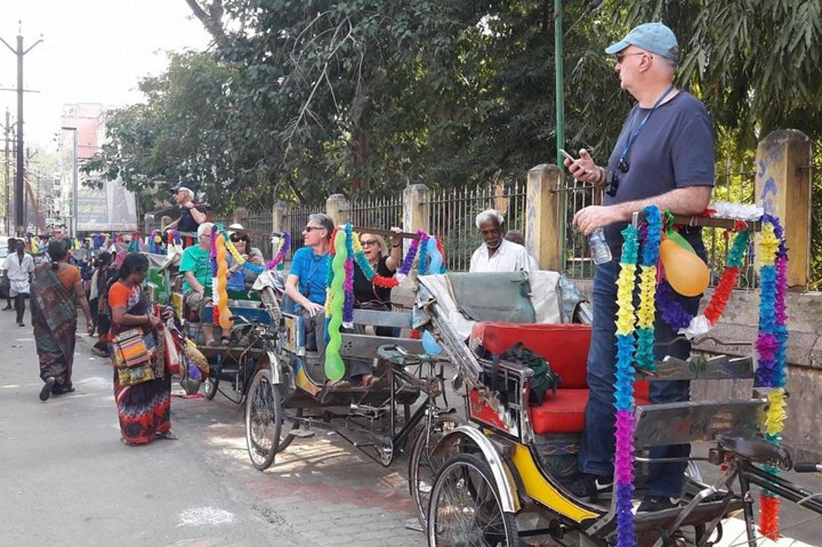a group of people riding in horse drawn carriages
