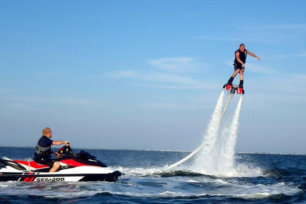 two people on a jet ski in the water