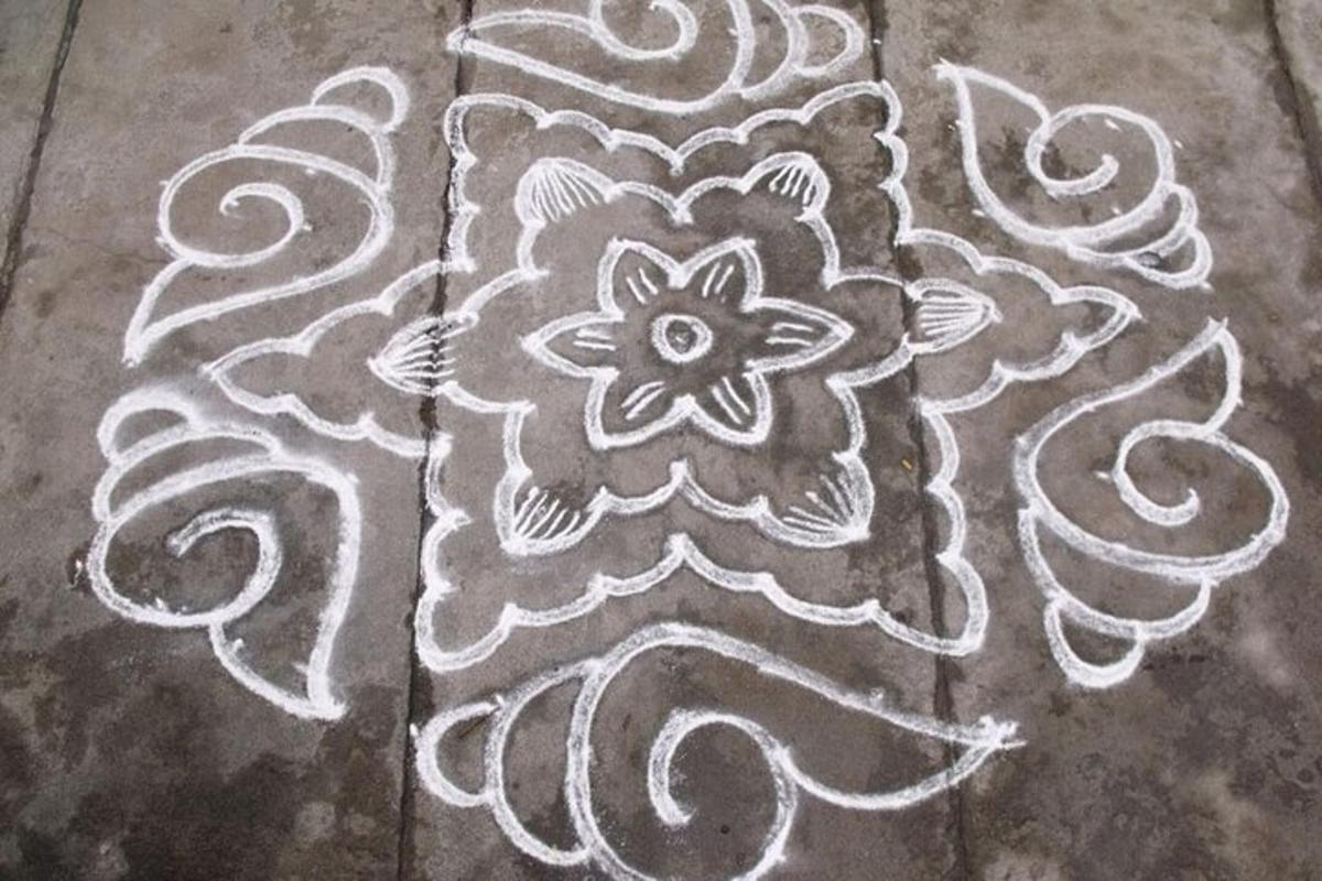 a drawing of a flower on the ground