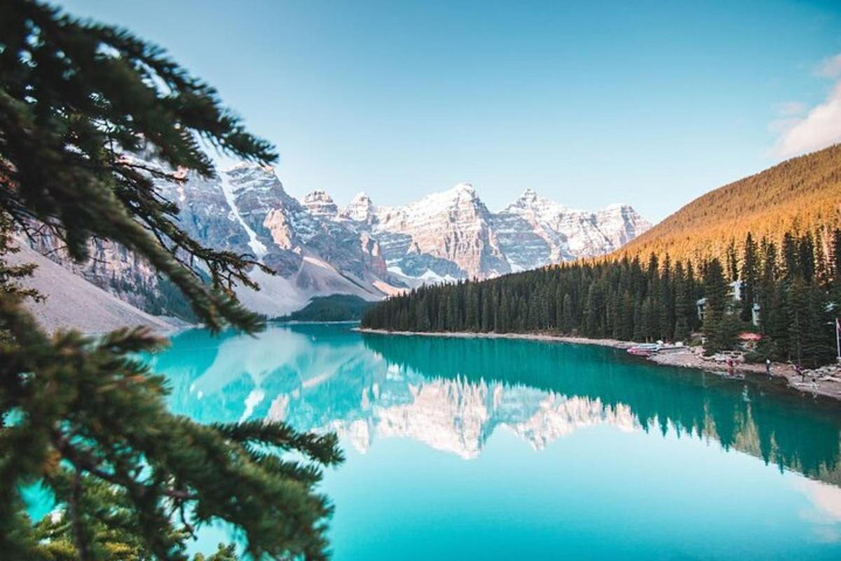 a view of a lake with trees and mountains