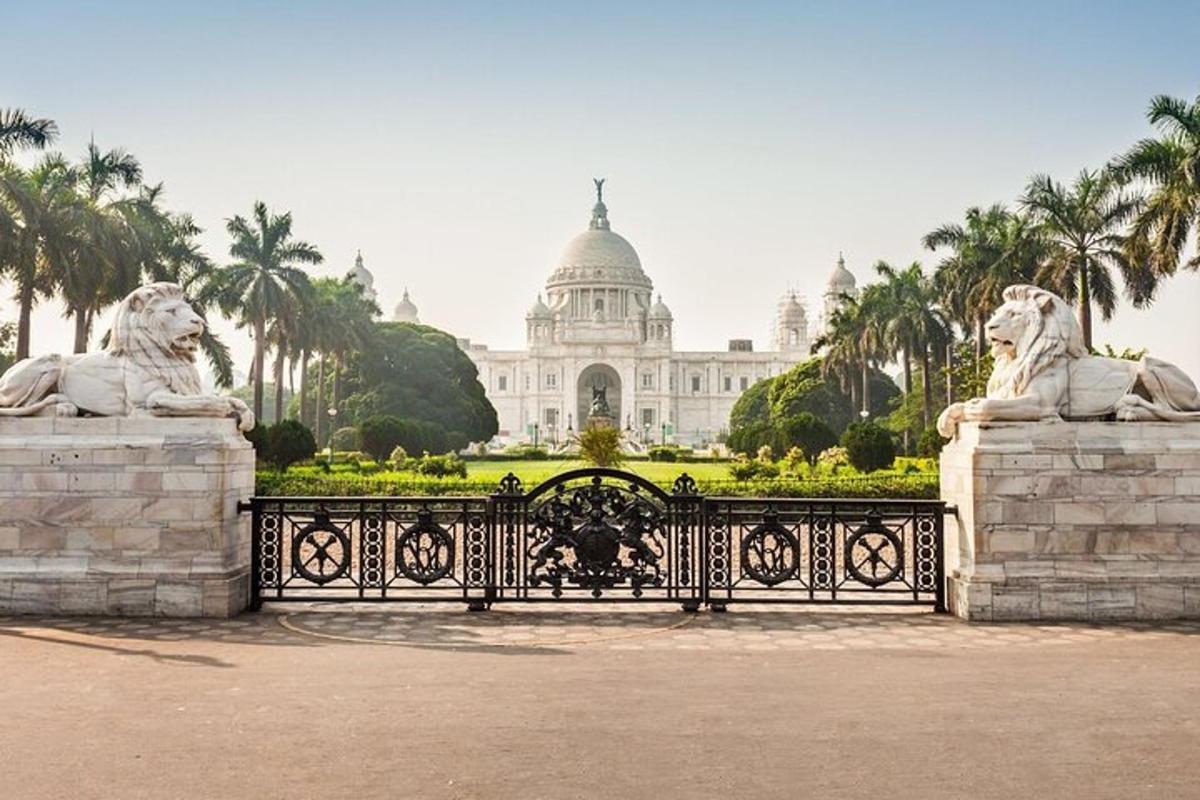 a bench in front of a building with two lions