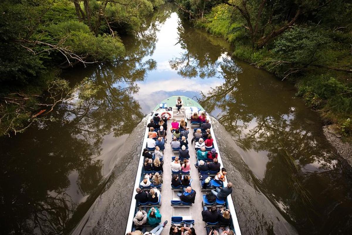 a group of people in boats on a river
