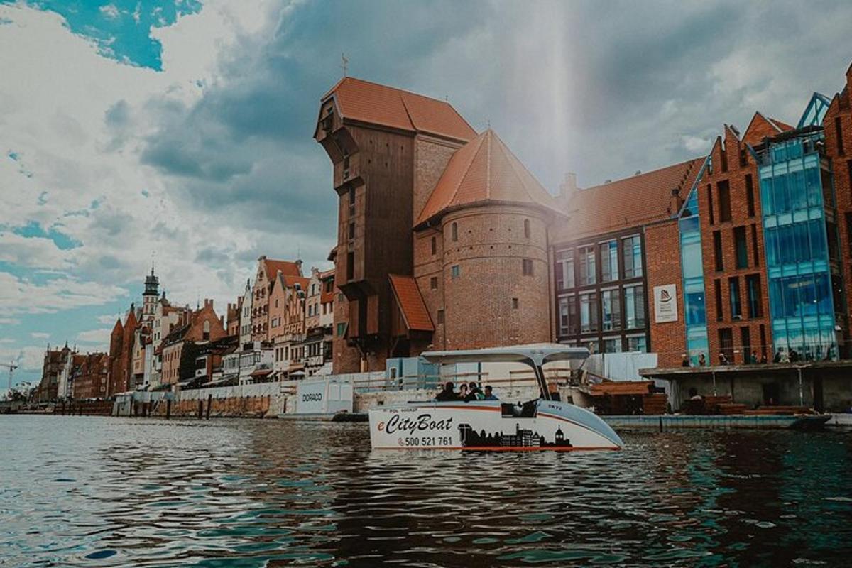 a boat in the water in front of a building