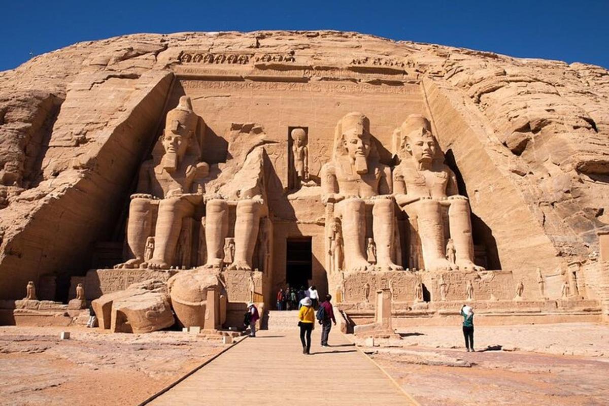 people standing in front of the ab temple