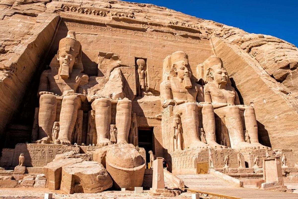 a large building with statues on the side of it