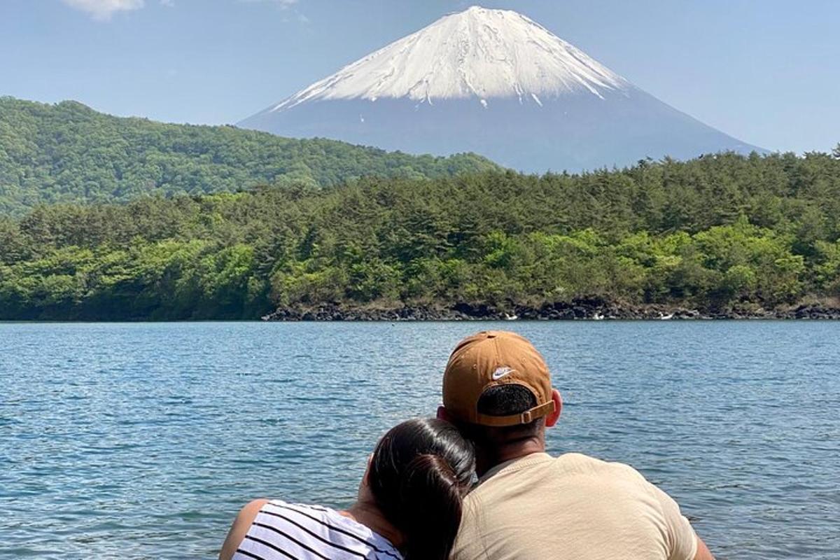 a man and a woman looking at a mountain