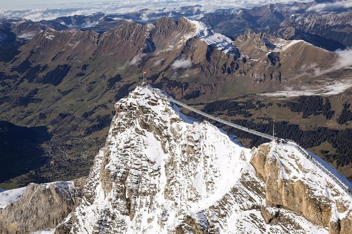 a mountain with a suspension bridge on top of it